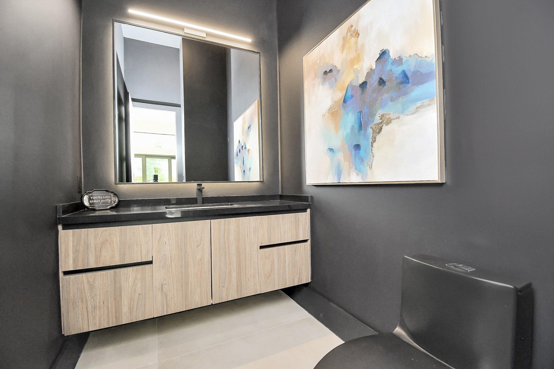 Powder room with custom wood vanity