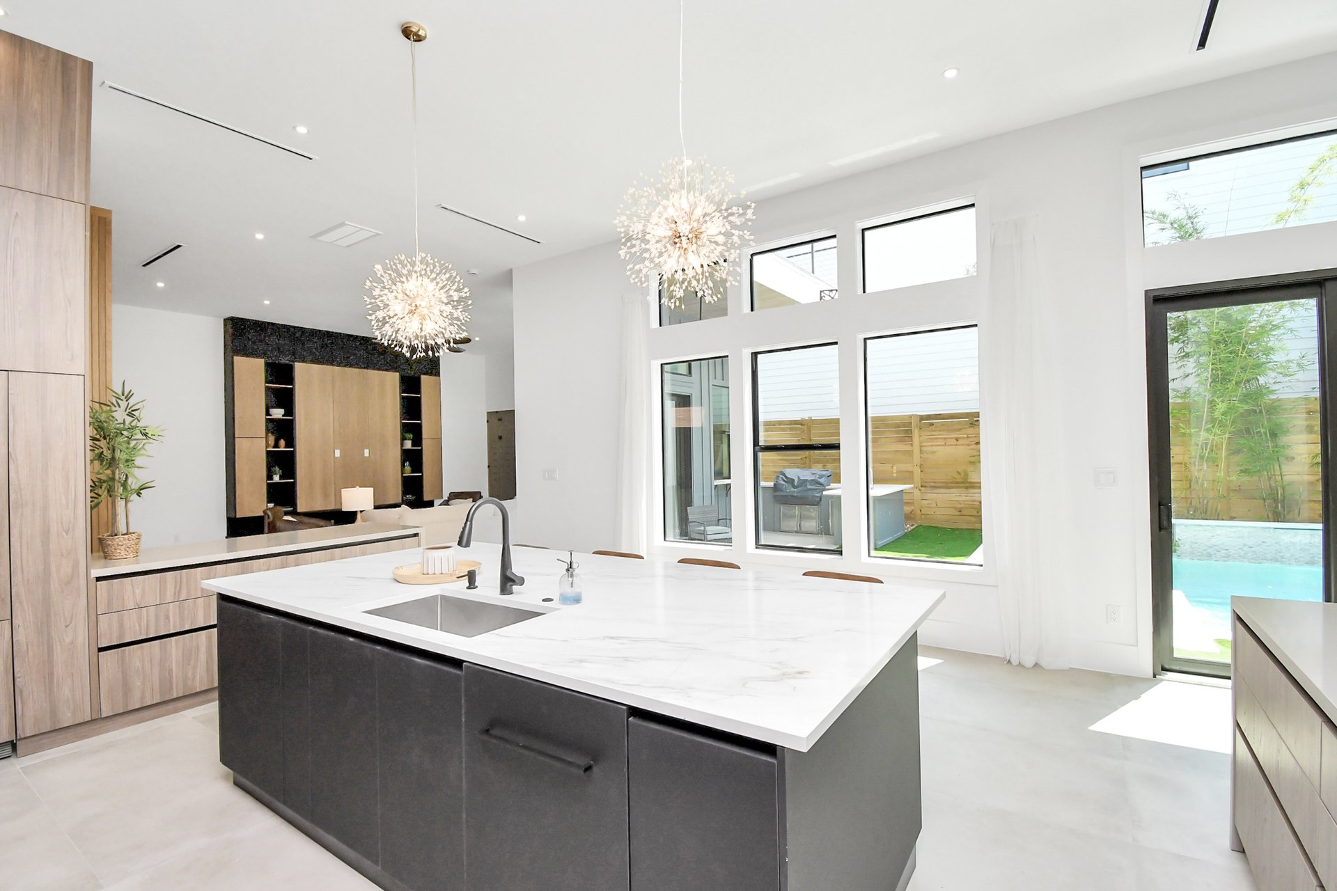 Kitchen island with views to the courtyard pool